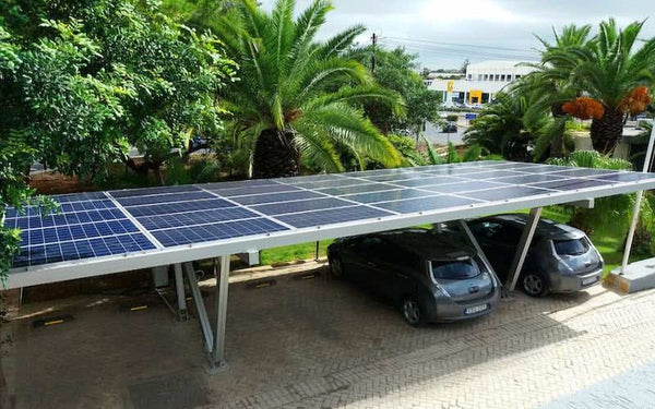 Cantilevered solar electric charging carport